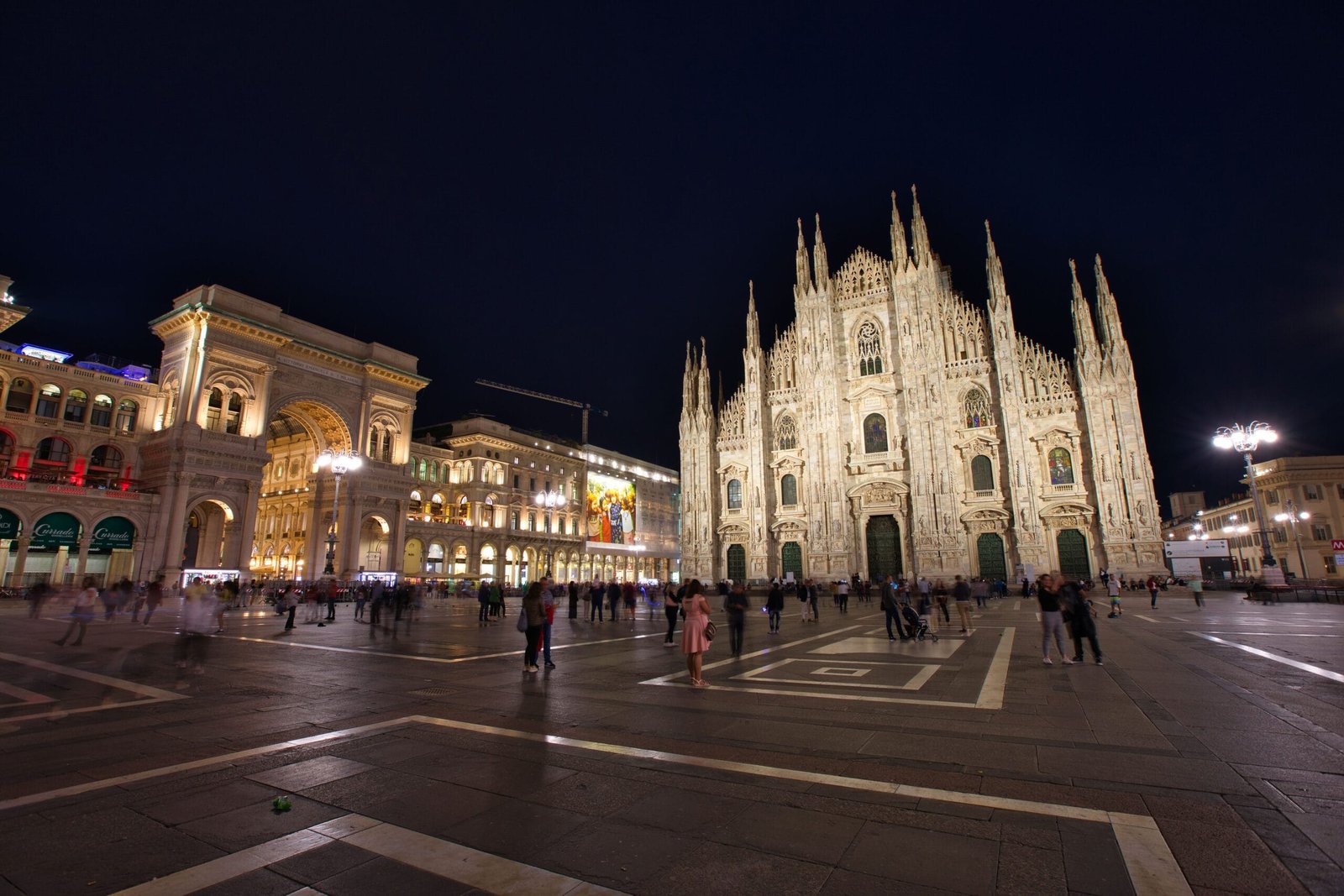 Milan Cathedral and Piazza del Duomo illuminated at night