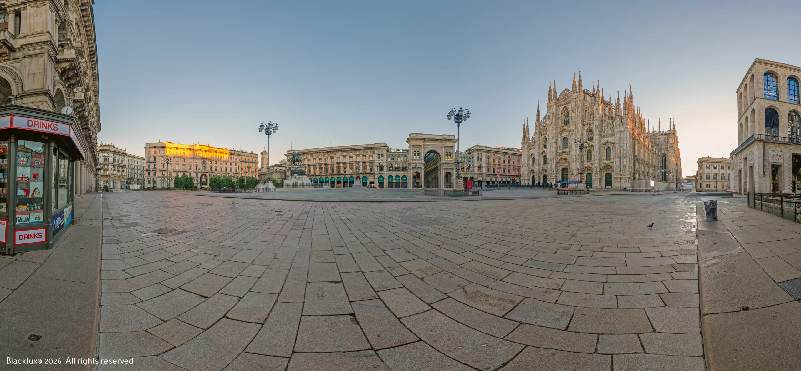 Wide view of Milan’s Piazza del Duomo in quiet morning light