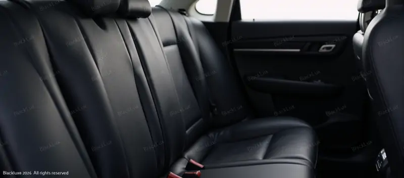Black leather rear bench with seat belts and three headrests