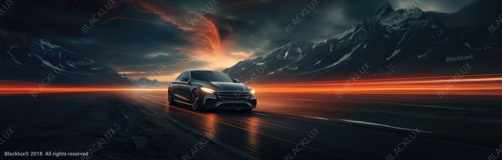 Wide cinematic image of a black sedan against mountain scenery with orange light streaks